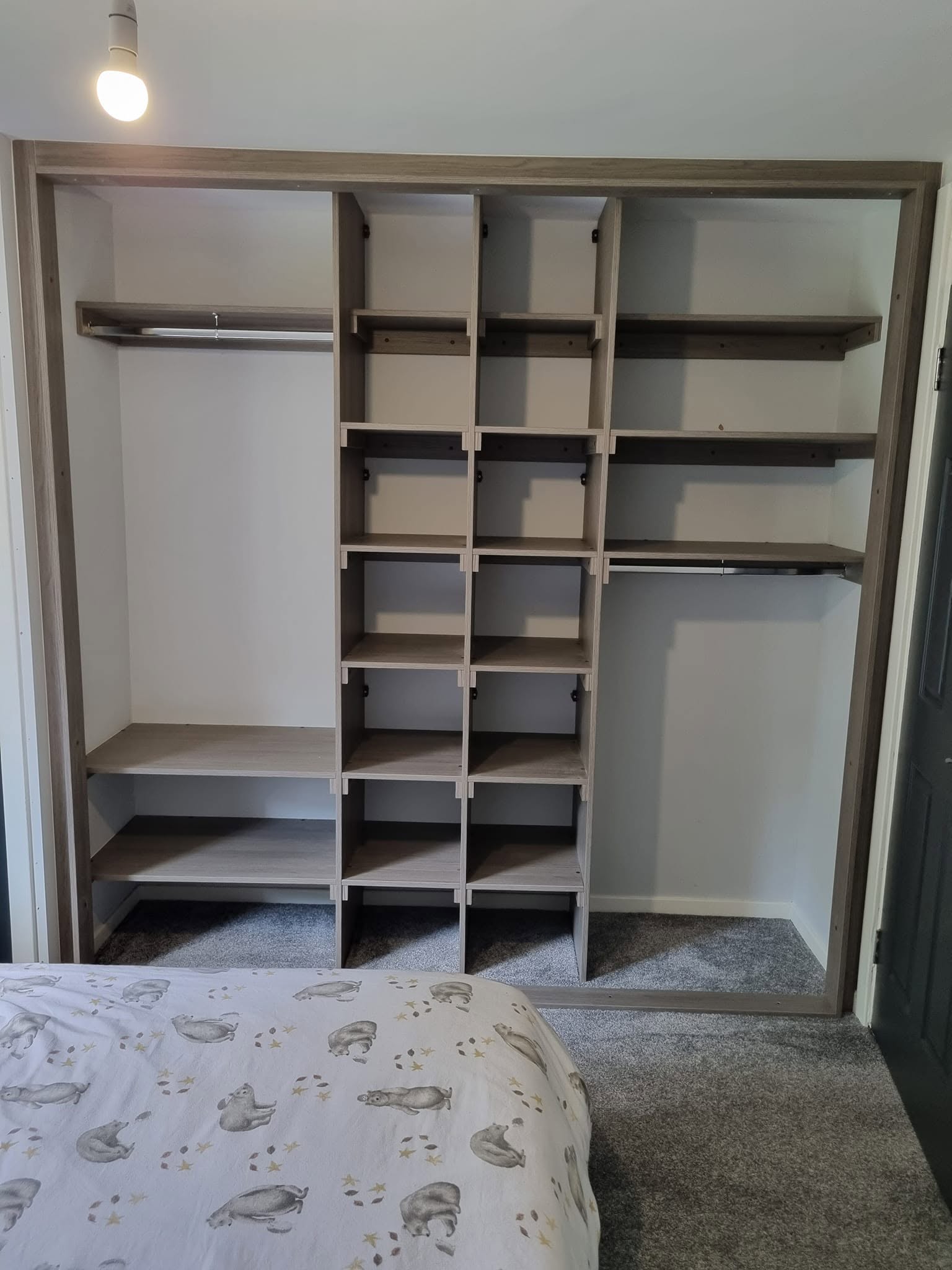Fitted wardrobe interior with bespoke shelving, drawers and hanging rails, Edinburgh